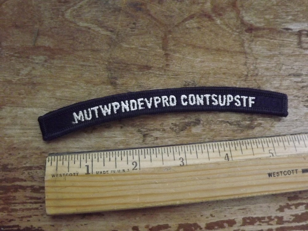 Navy MUTWPNDEVPRO CONTSUPSTF Tab - INV# C1496