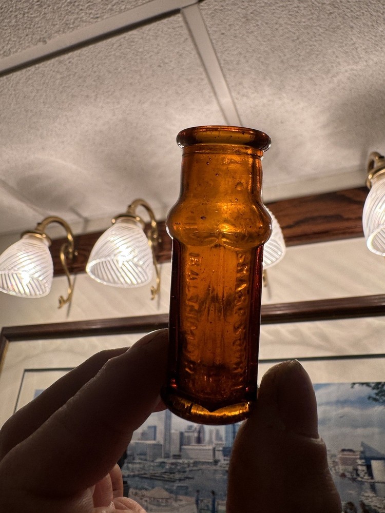 Sharp & Dohme Baltimore MD Small Amber Emb Multi-Sided Poison Bottle 1910s Era