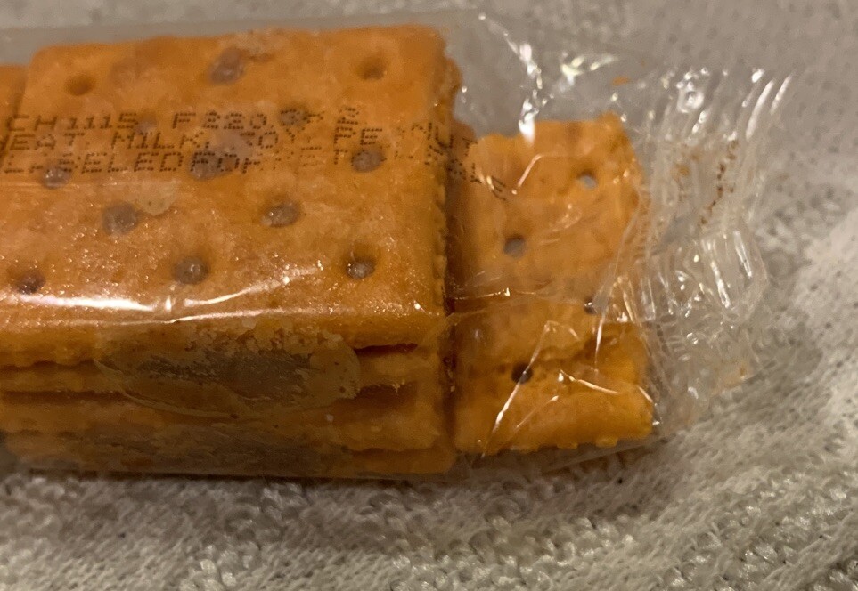 Manufacturing Error Four Pack Of Crackers With Extra Part Of Cracker In Pack