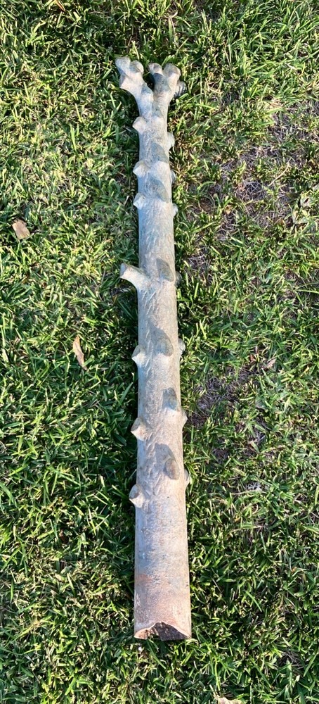 Antique cast iron tree hitching post. 4' by 4" wide. Piece broken off bottom.