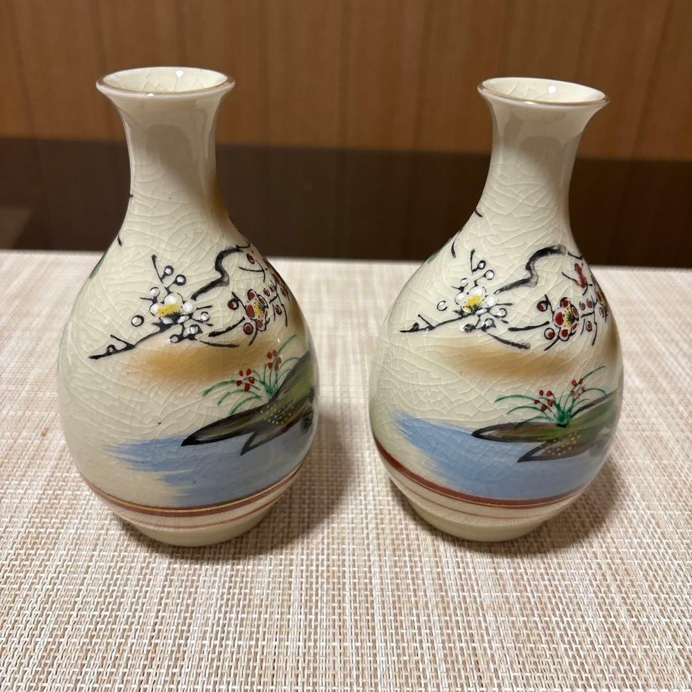 Kutani ware sake bottle and choko set