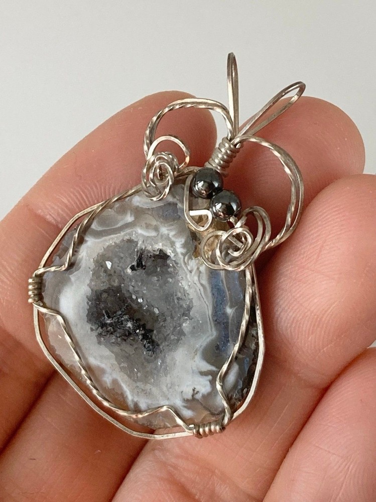Handcrafted silver wire geode agate pendant