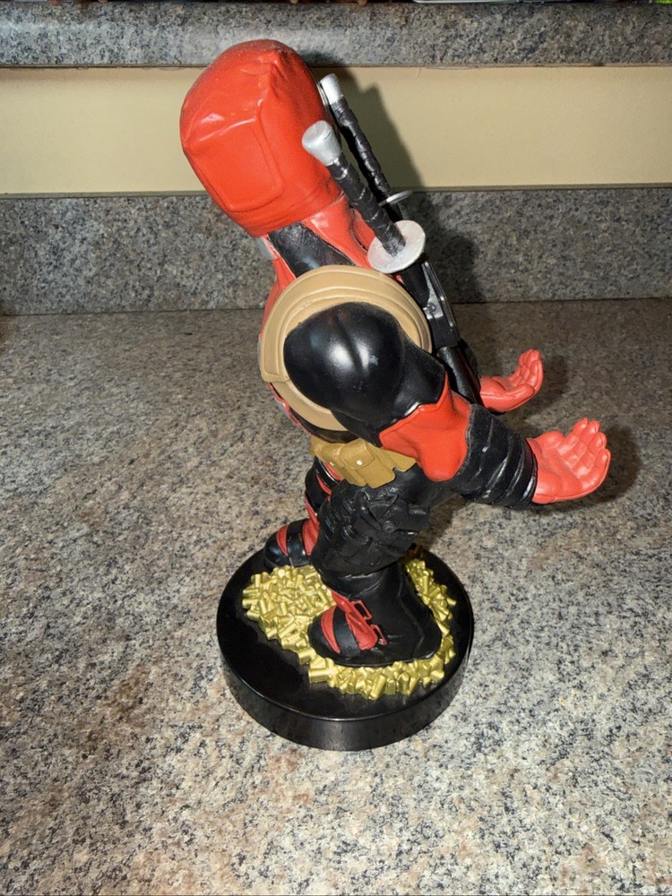 Deadpool controller/phone holder. Marvel Cableguys. Good shape. About 9 " High.