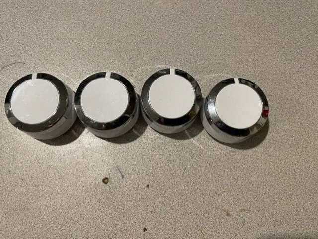GE washer model GTW485ASJ3WS  knobs.   Four knobs