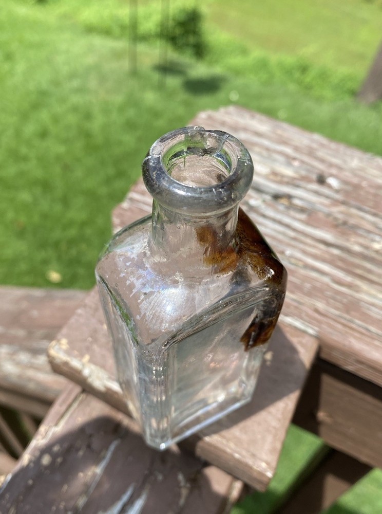 The Singer Sewing Machine Co Bottle