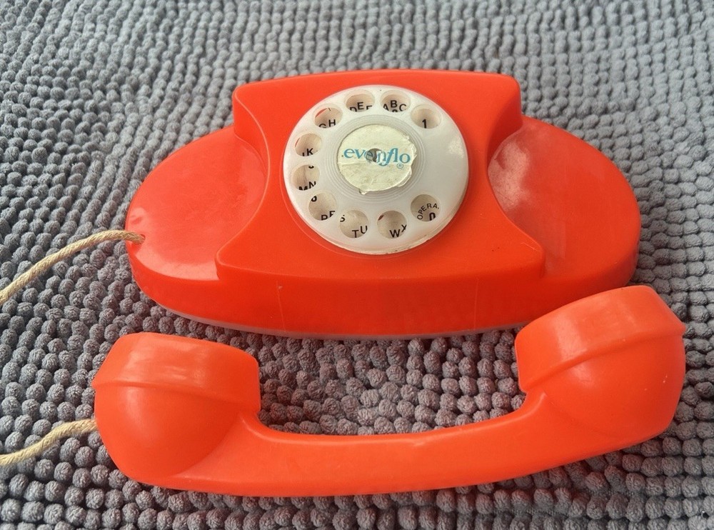 Vintage Evenflo Plastic Orange Dial Phone Toy