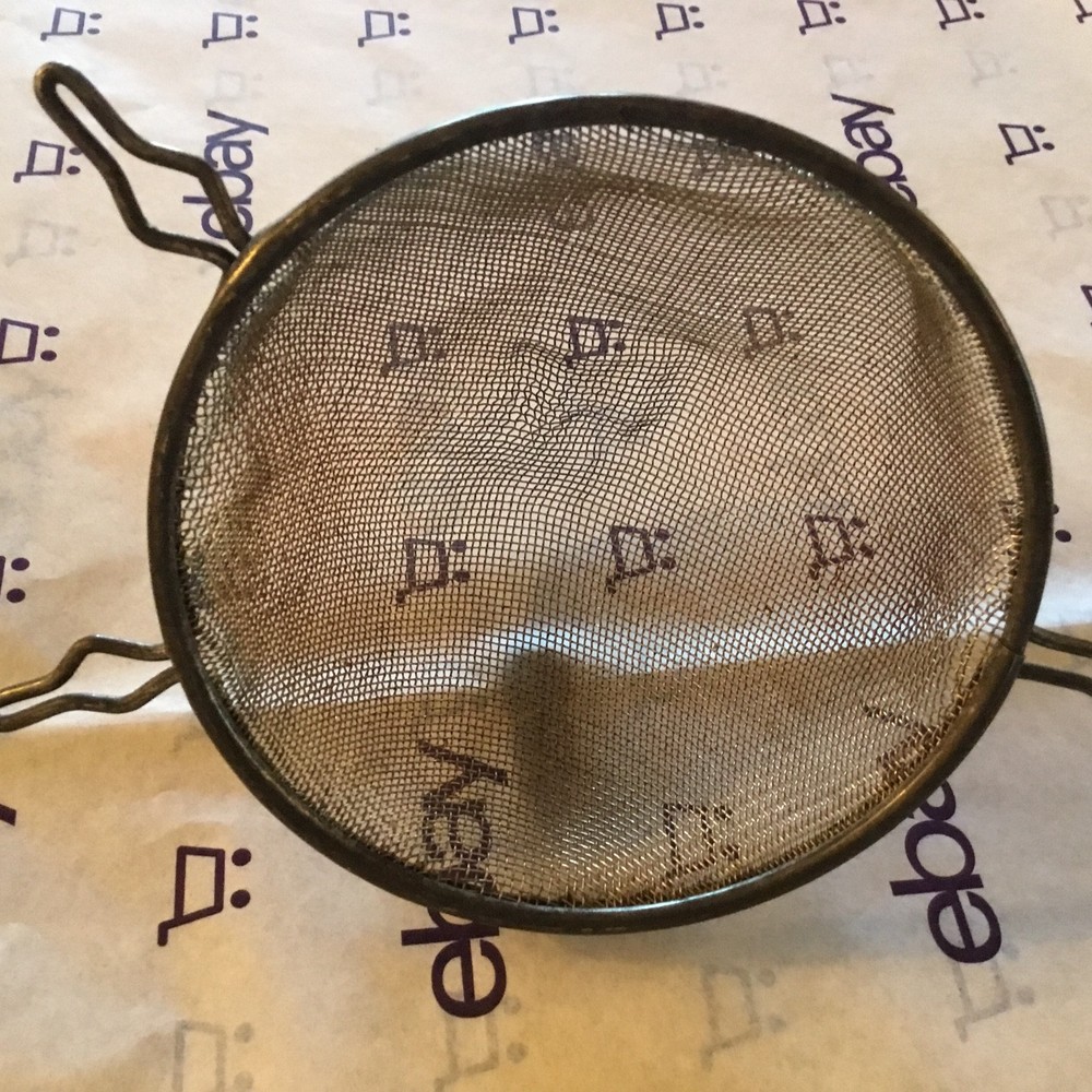 small old metal strainer basket