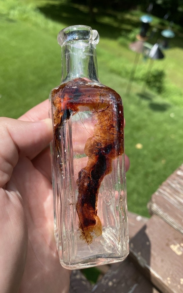 The Singer Sewing Machine Co Bottle