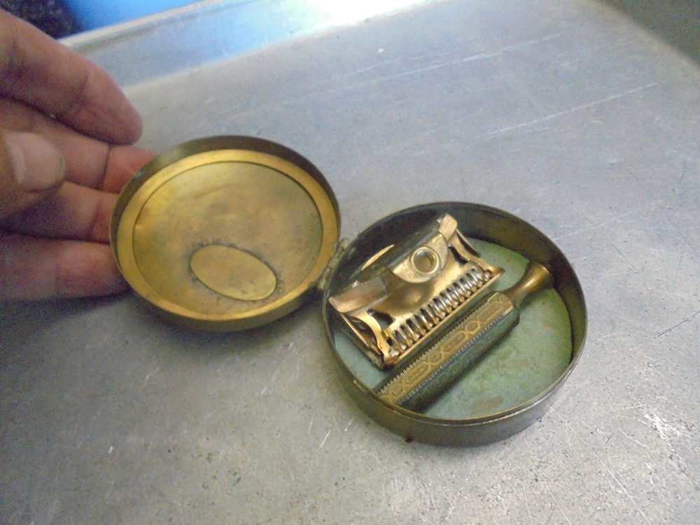 Vintage Ever-Ready Razor in brass circular case
