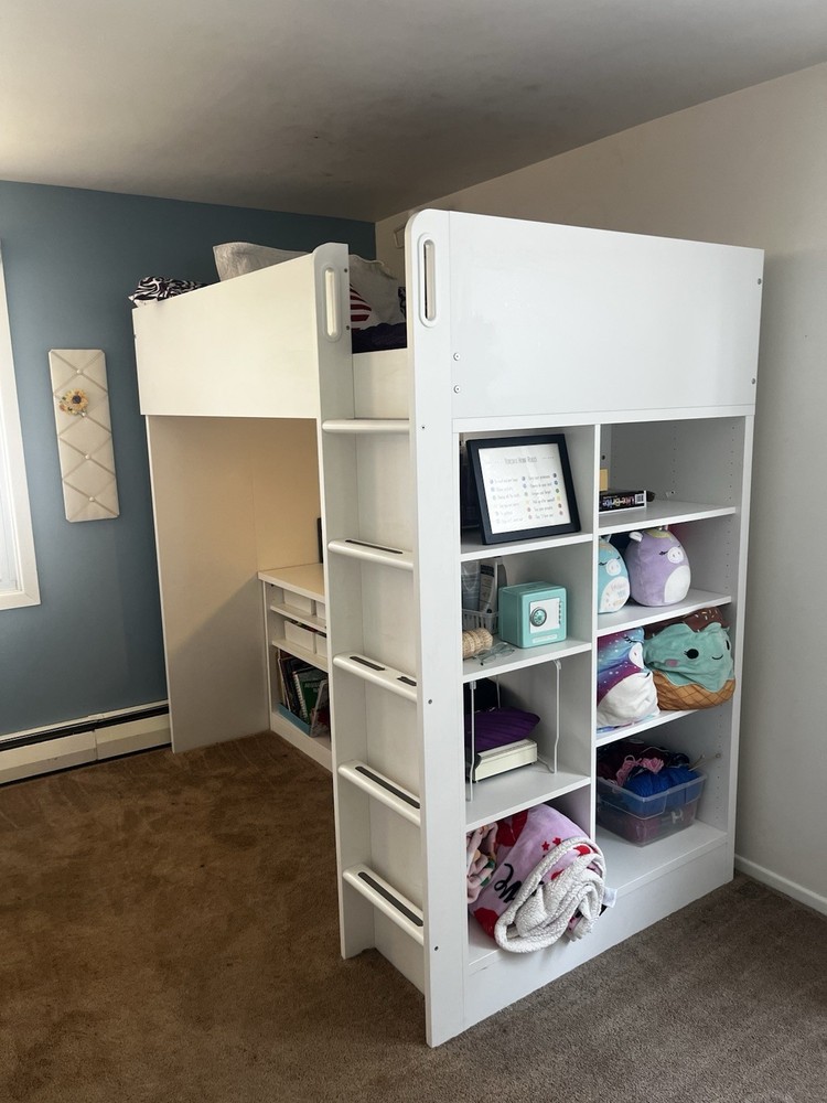 ikea loft bed with extra shelving and desk