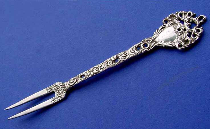 Serving fork with pierced decor, C. Widmann, 830 Silver B67
