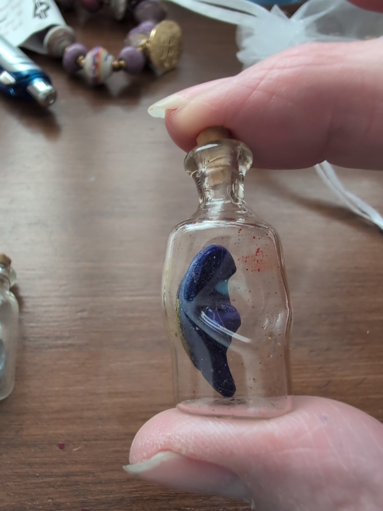 2 Tiny Tiny Bottles With Bird And Dice Inside