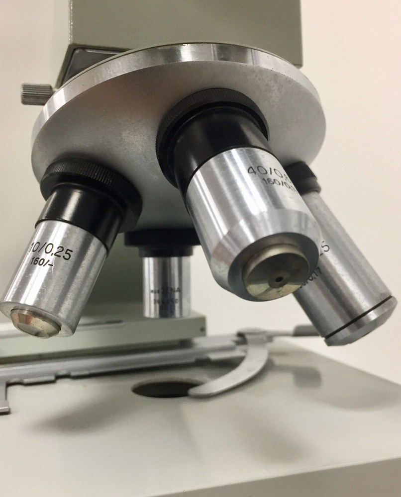 ZIESS ausJENA Microscope with 4 Objectives and light source