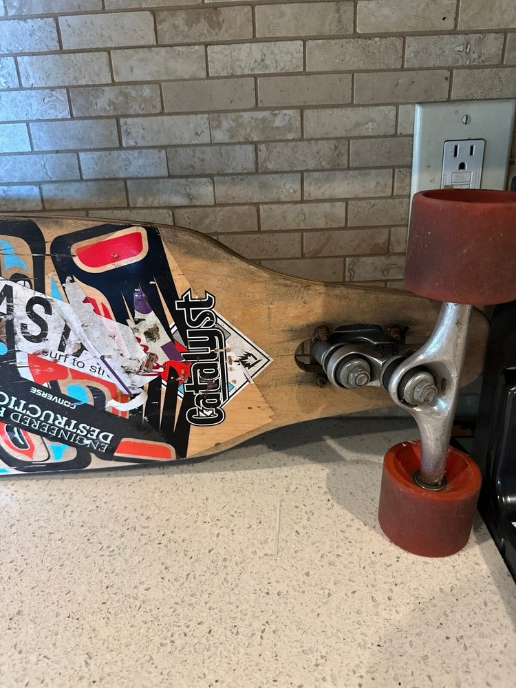 Catalyst longboard with gull wing trucks