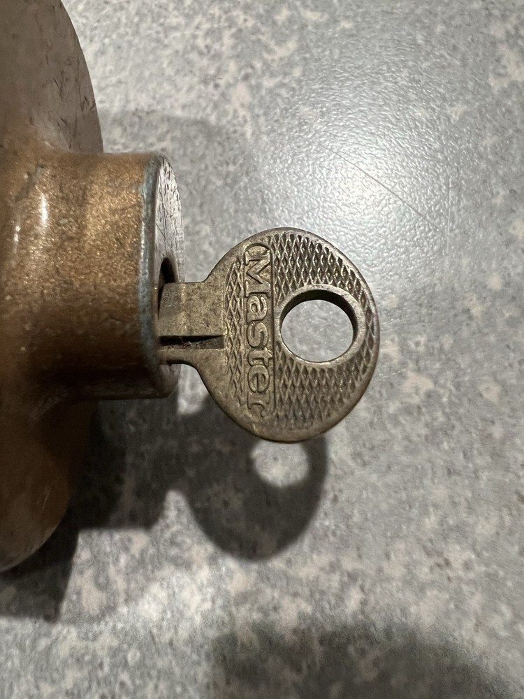 Vintage Master Lock, Two-Piece Trigger Lock with Key