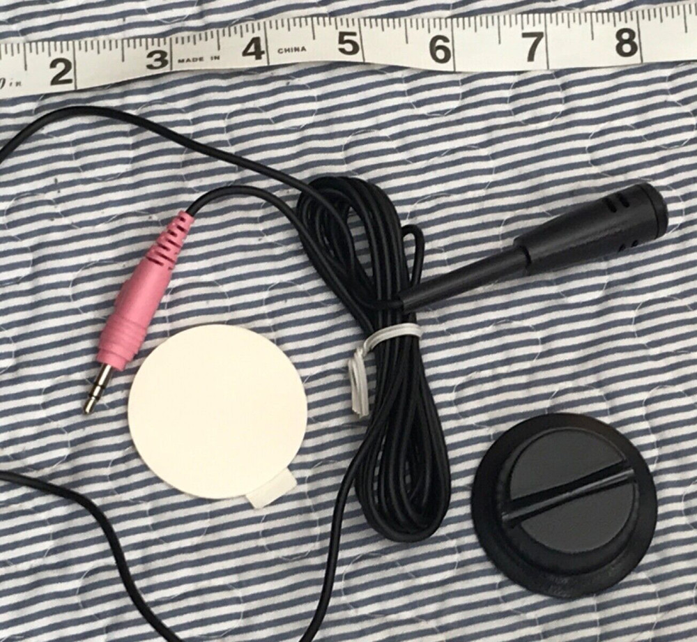 Mini microphone attachable to wall or desk