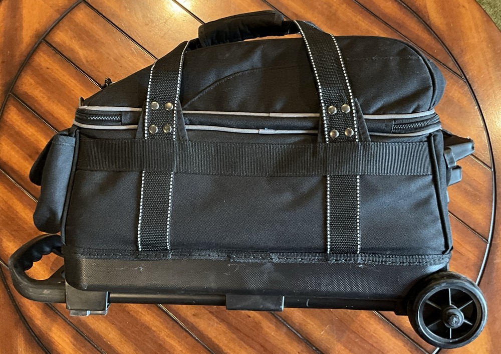 2 Bowling Balls And Roller Carry Case