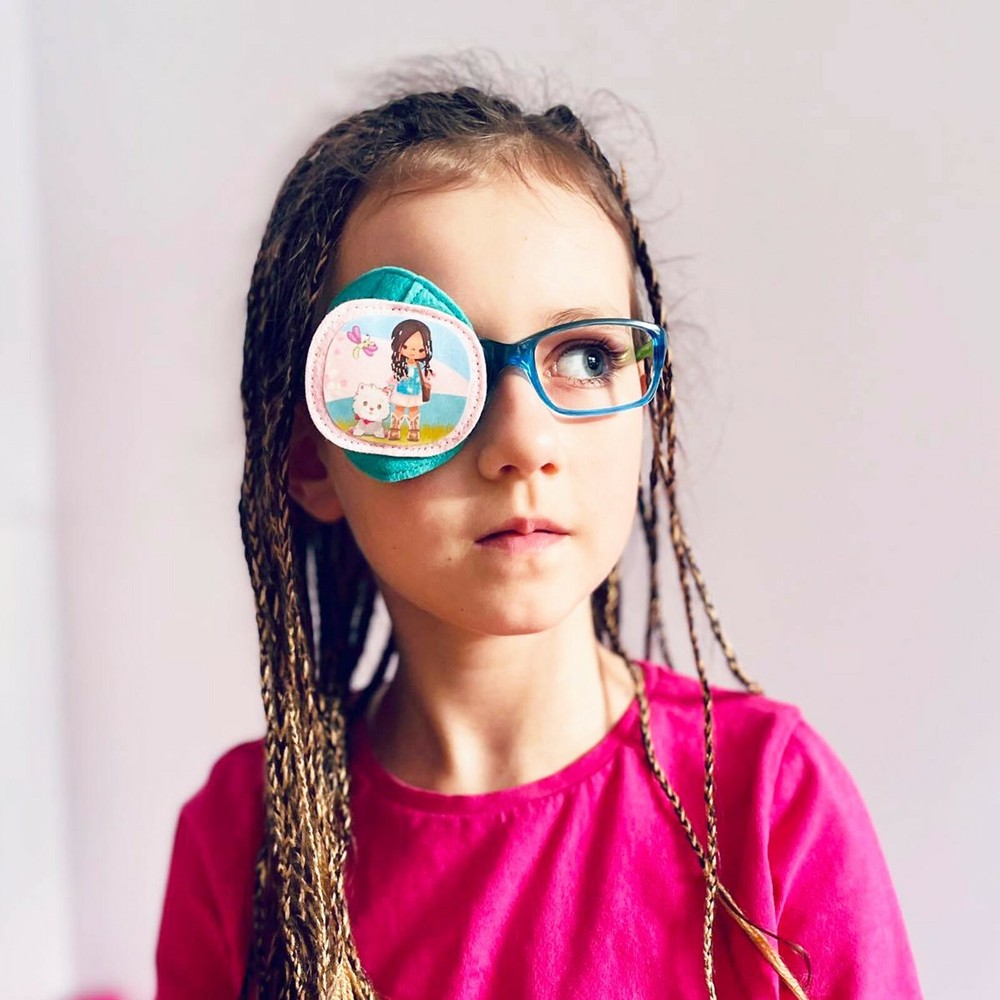 Playful comfortable kids fully obscured eye patch