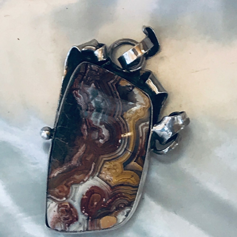 Estate E. Herrara Signed Reddish Brown Black & White Agate Stone in Curled Silve