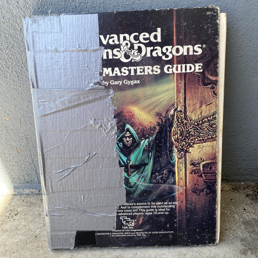 TSR Advanced D&D: Dungeon Masters Guide by Gary Gygax, 1979 - Binding Taped