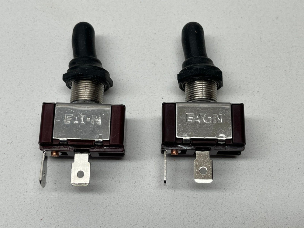 PAIR OF EATON MOMENTARY TOGGLE SWITCHS