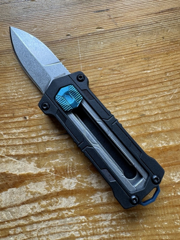 Kershaw Kapsule Manual Open Sliding Button Lock Single Edge Spear Point Blade
