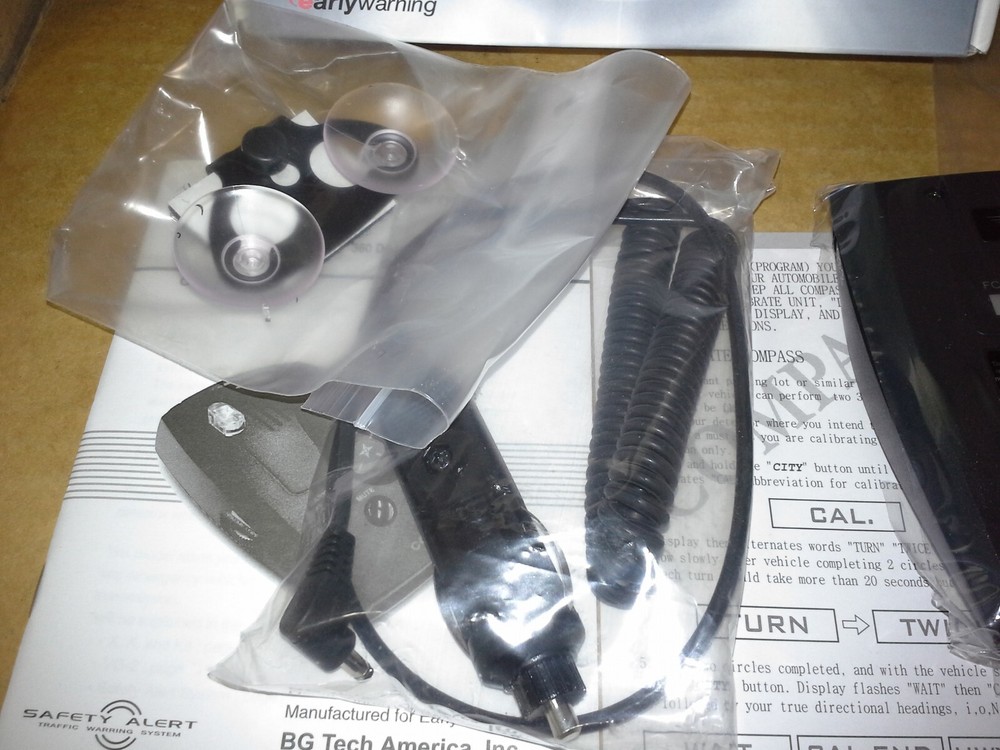 Early Warning RSX-555 Compass/Voice Radar /Laser Detector. open box