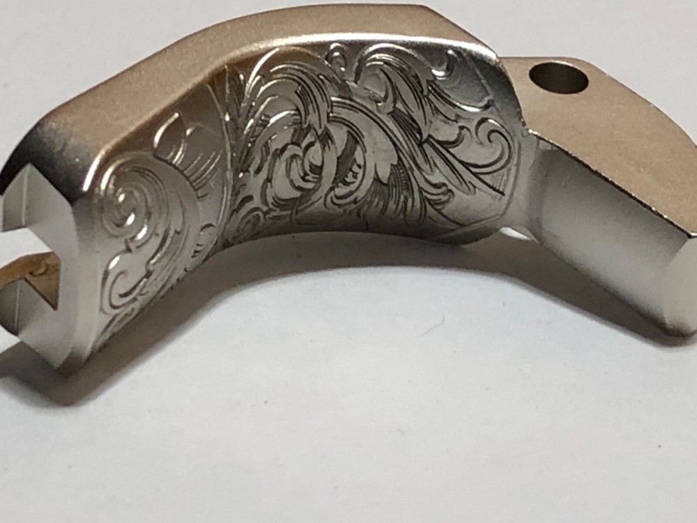 1911 GI Style Grip Safety - NEW satin nickel deep laser engraved scroll pattern