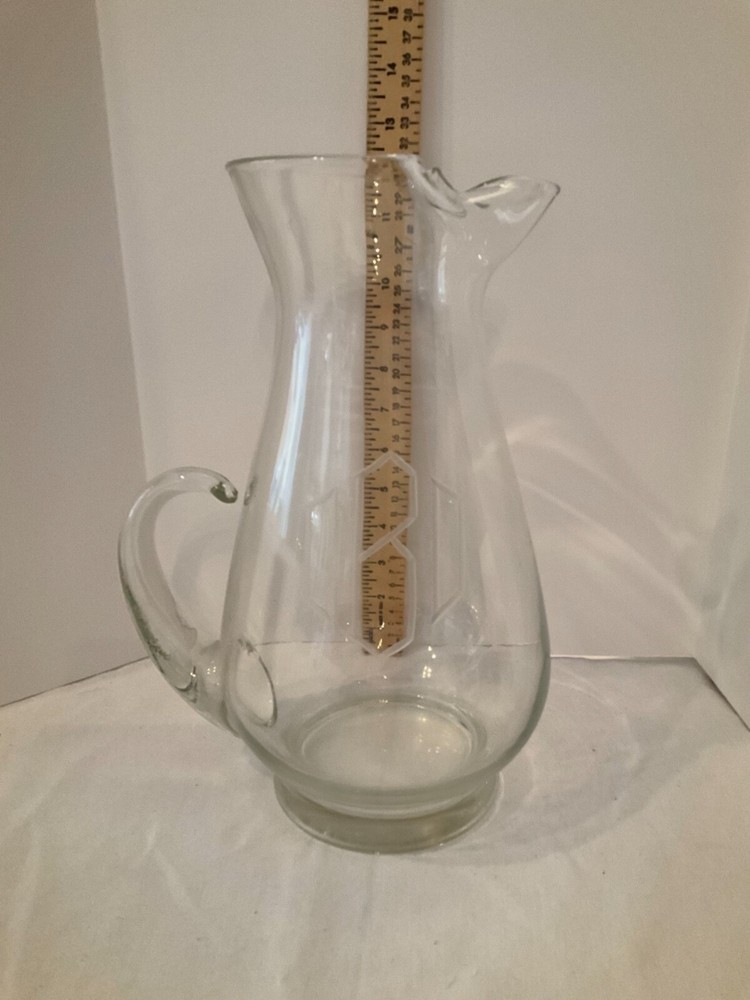 Clear Glass water pitcher etched BCD 12”