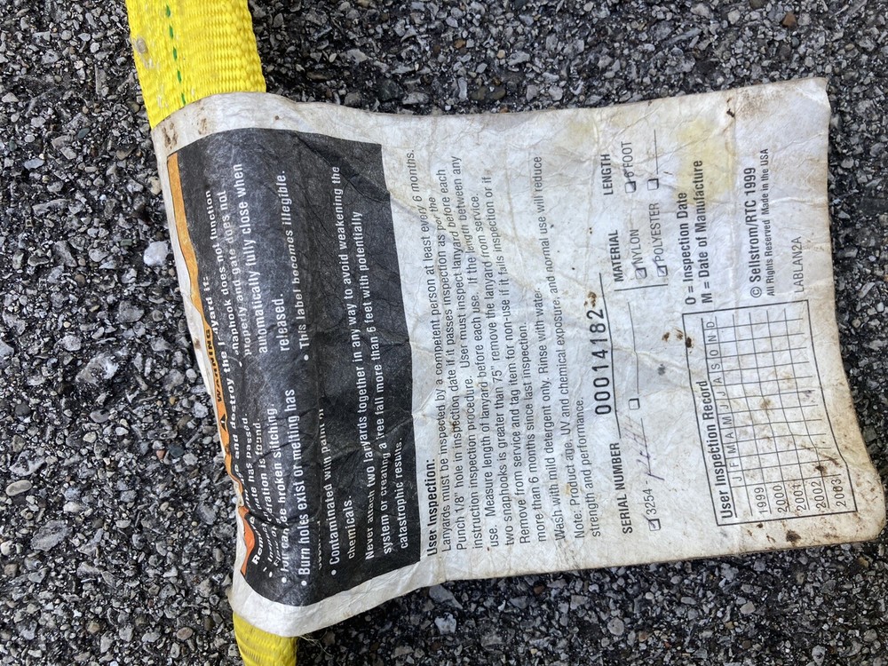 safety harness with strap attached