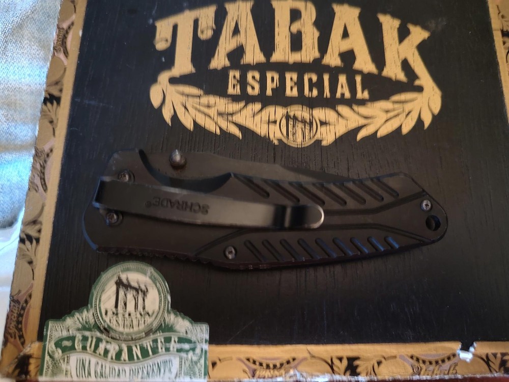 Schrade Folding Pocket Knife with Black Handle