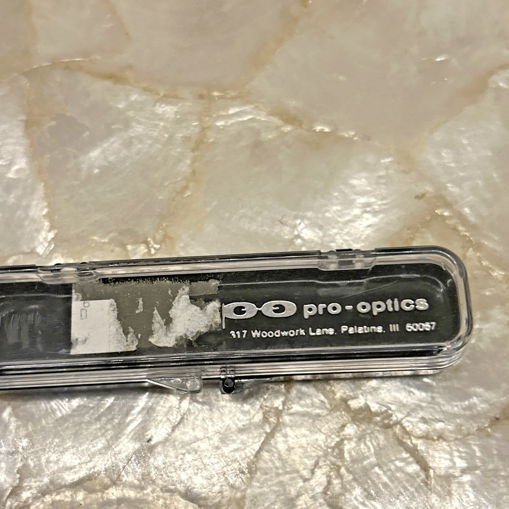 pro-optics adjustable eyewear retainer strap in plastic case New