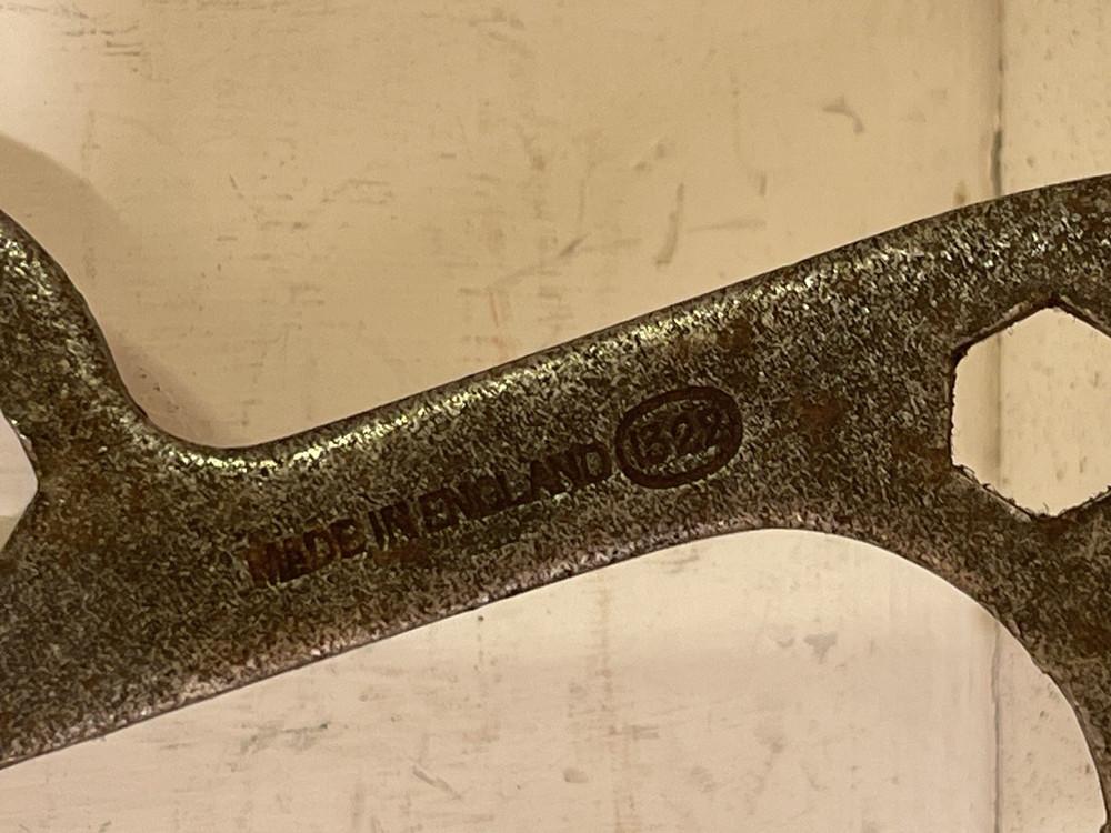 A vintage British mullti-use bicycle spanner