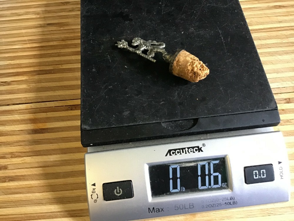 KING LION CORKTOP STOPPER HELP......what is it ??? pewter ??