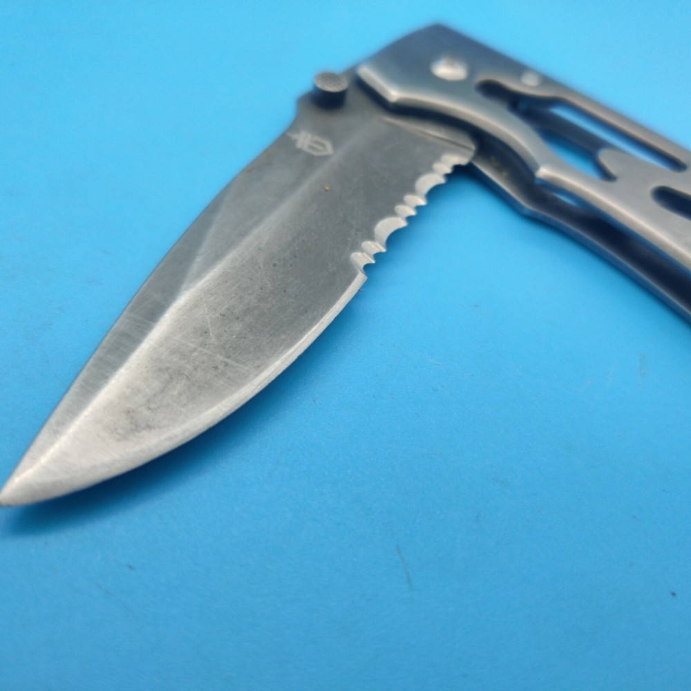 USED GERBER FOLDING PARAFRAME KNIFE PARTIALLY SERRATED BLADE SHARPENED