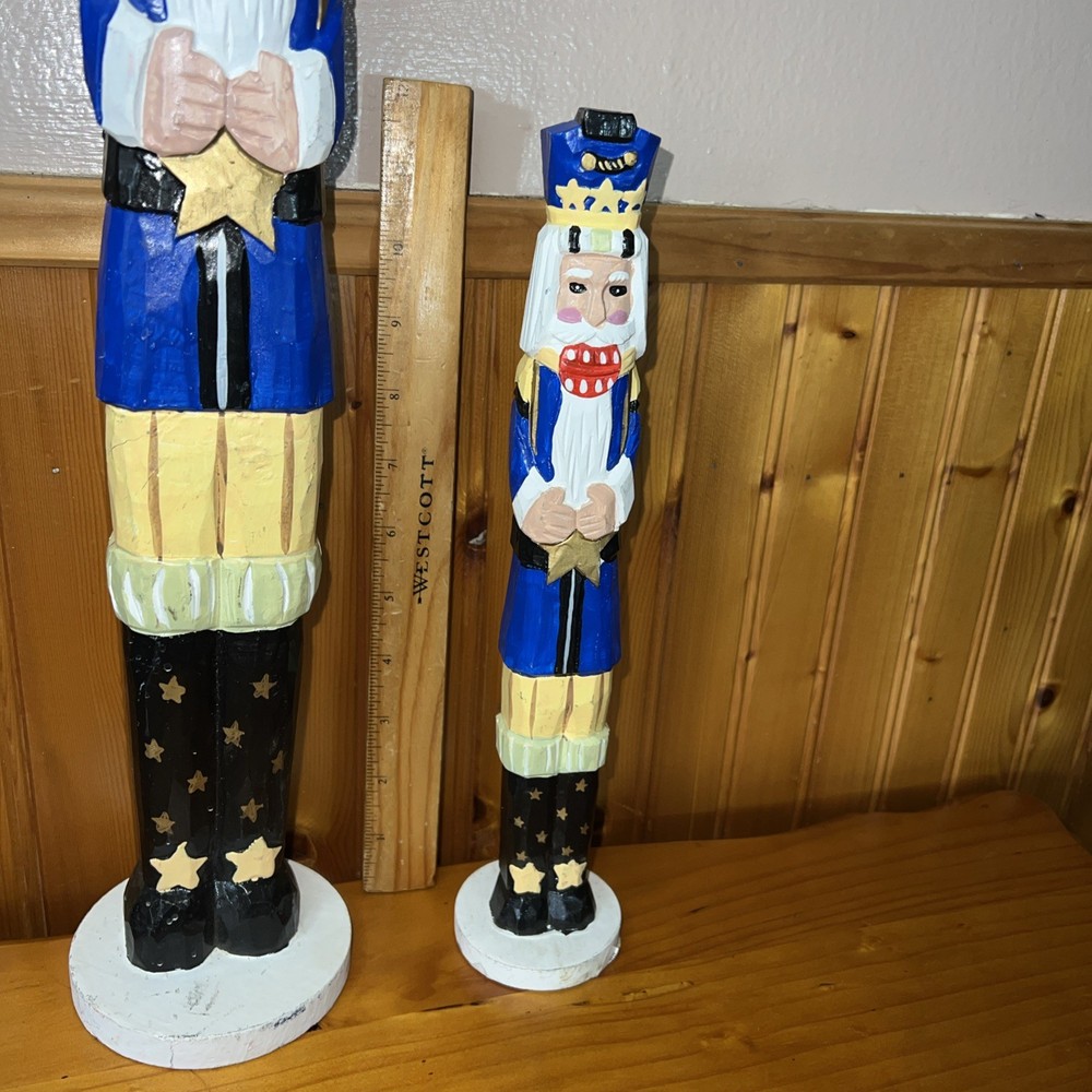 2 Tall decorative nutcracker figurines