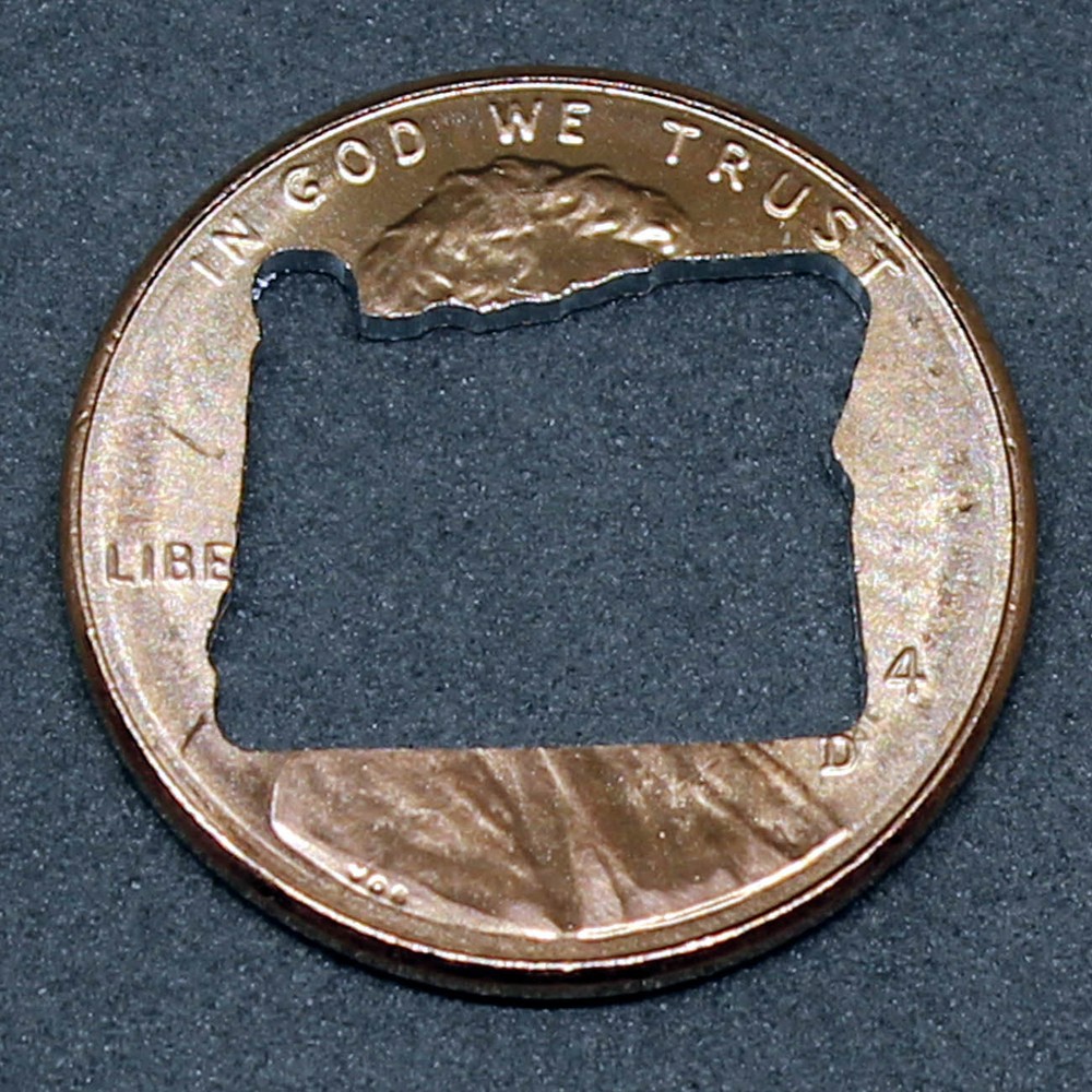 Lucky penny with Oregon cut out