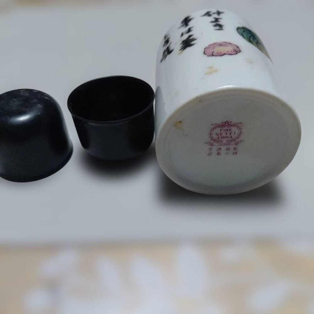 Ceramic sake bottle and cup set