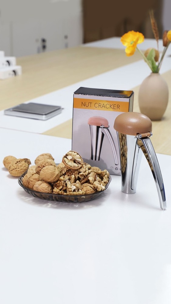 Heavy Duty Nut Cracker Tool with Splash-Proof Lid, Ergonomic Self-Retracting Han