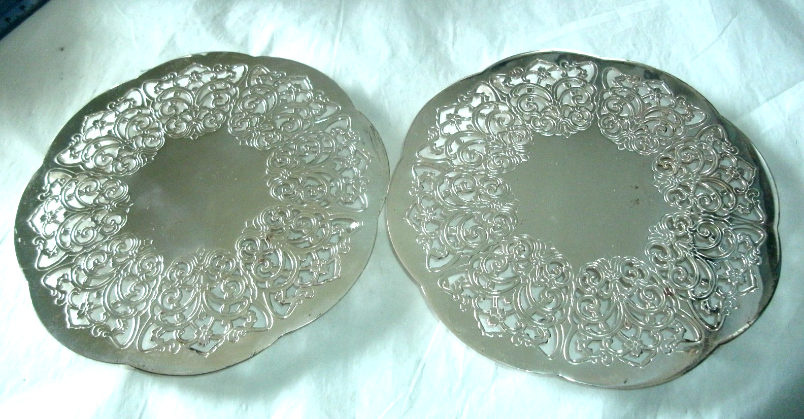 2 VINTAGE FOOTED SILVERPLATE TRIVETS, MADE IN WESTERN GERMANY, 6"