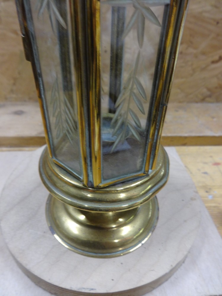 A Brass Candle Lamp.
