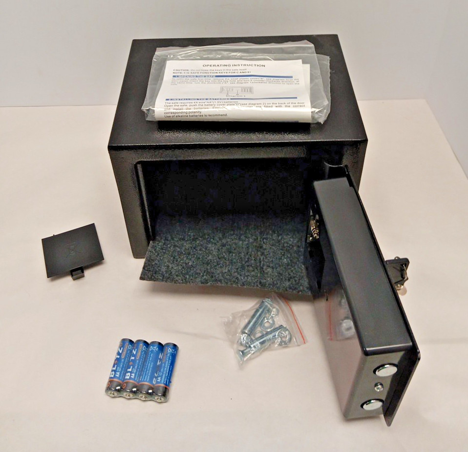 electronic security safe box with a keypad and key access.