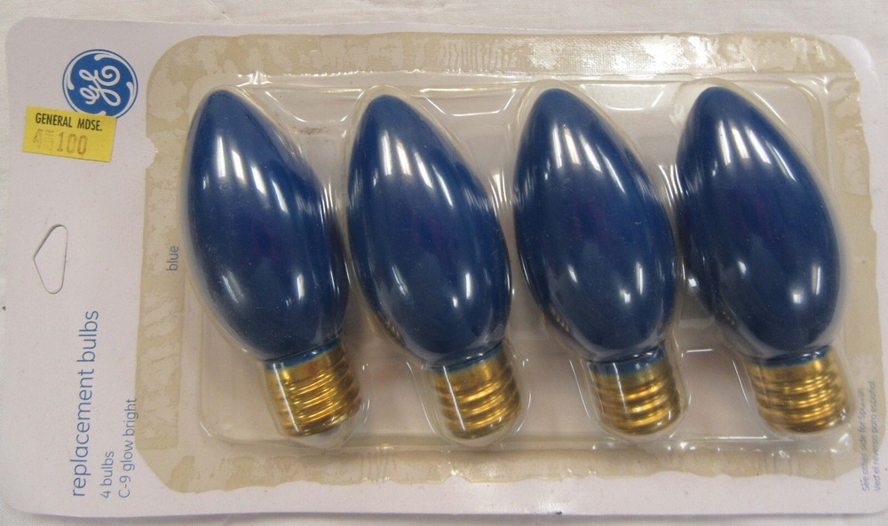 4 blue replacement C-9 bulbs. Intermediate base. 120 volt. 8 pks. available. NOS