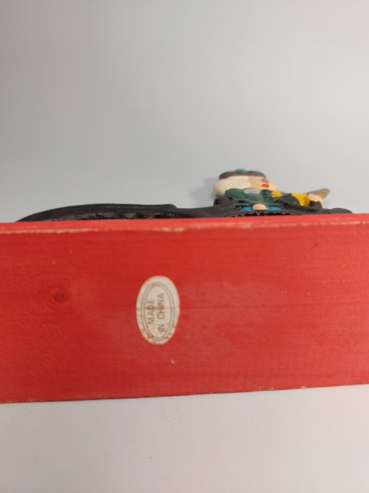 Cast Iron Painted Soldier Nut Cracker on wood base