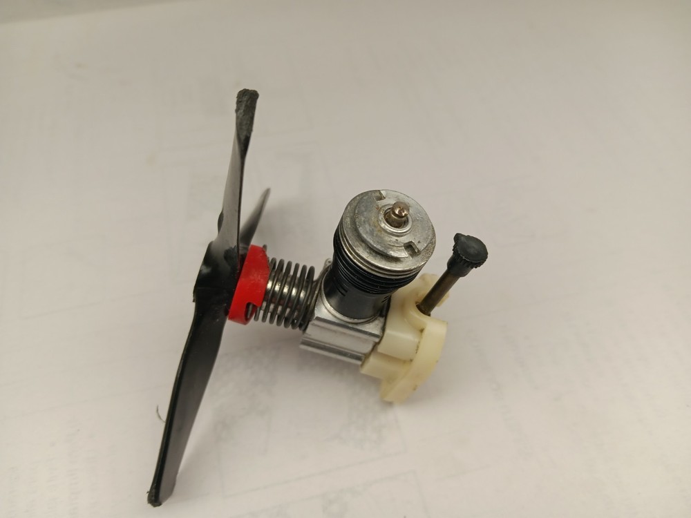 Vintage COX Product Engine with Two three Prop & Spring Model Engine
