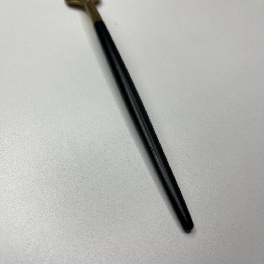 Gold Tone Fork With Matte Black Rounded Handle Modern And Elegant