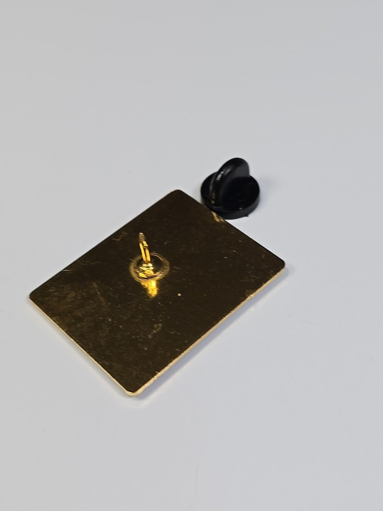 Page March 2000 Lapel Pin