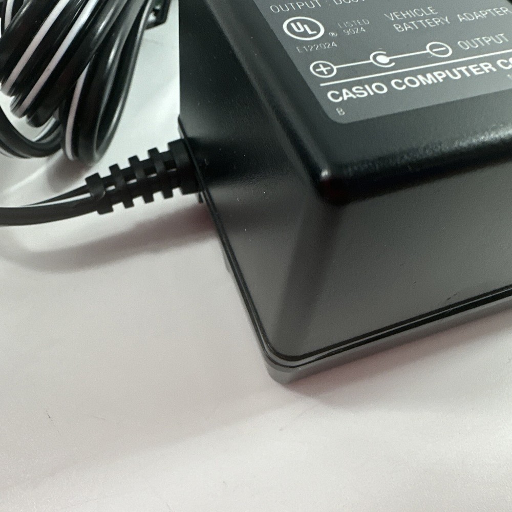 Casio Car Adaptor Plug Model CA-K65 Input DC 12V 13W Output DC 6V, 1A