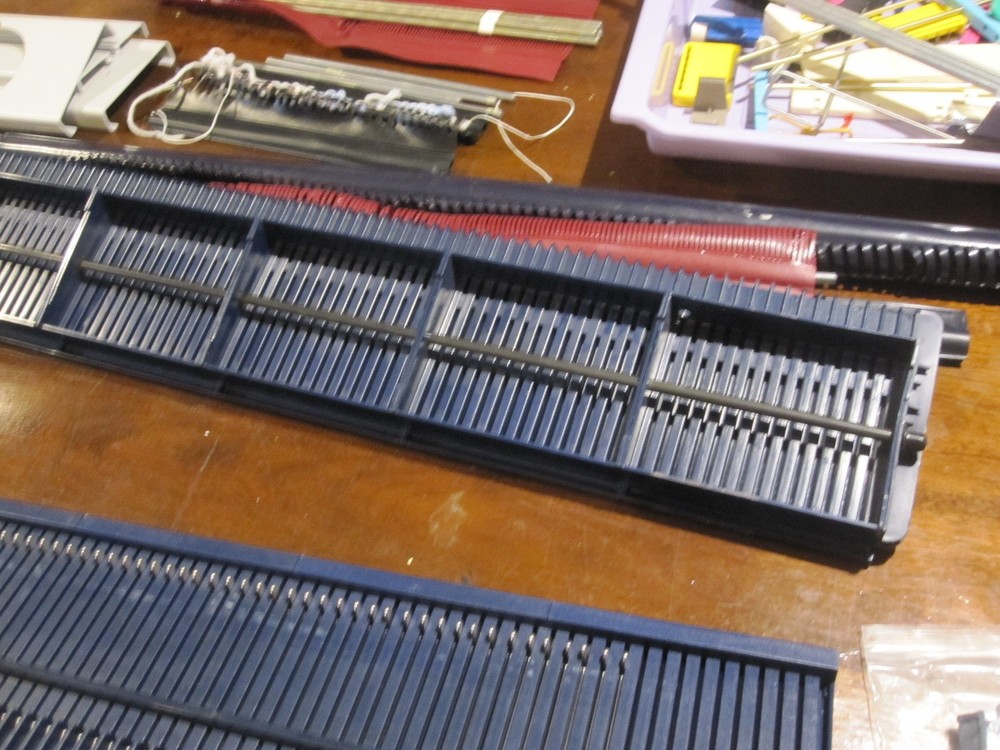 Bond Knitting Machine Two Beds Plus Extensions, Cast on Combs, some Accessories.