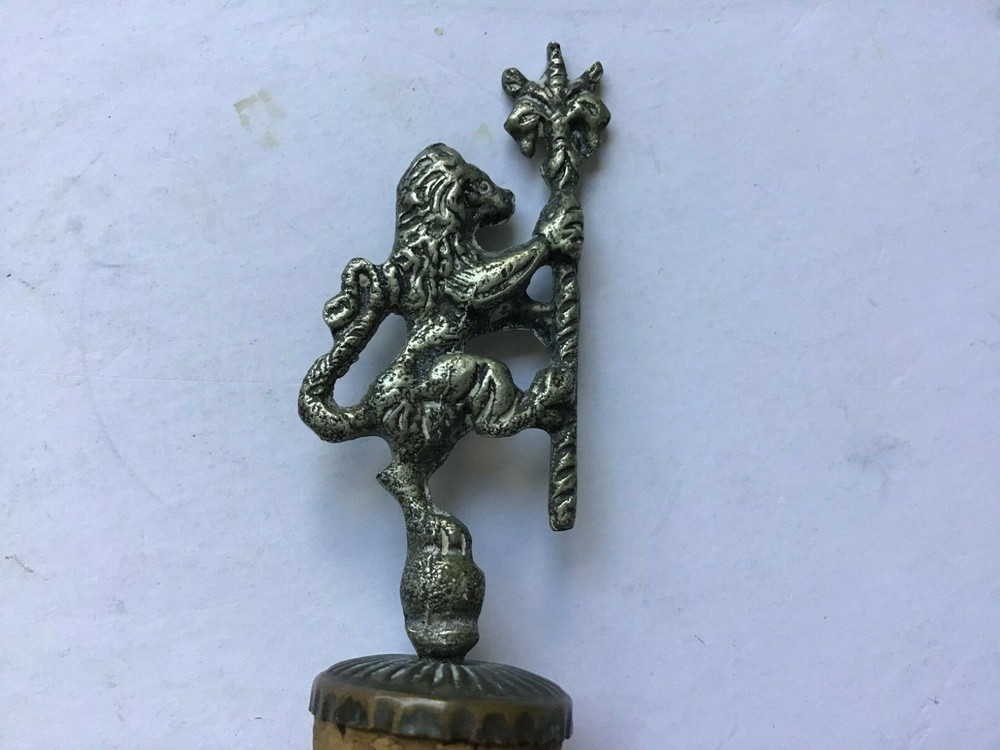 KING LION CORKTOP STOPPER HELP......what is it ??? pewter ??